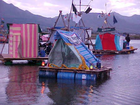 A raft floating on water near at sunset